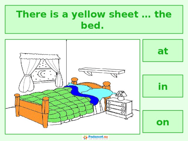 There is a yellow sheet … the bed. at in on