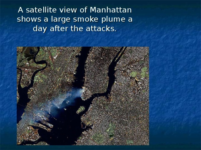 A satellite view of Manhattan shows a large smoke plume a day after the attacks.   